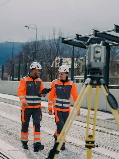 Engineers on site with survey equipment